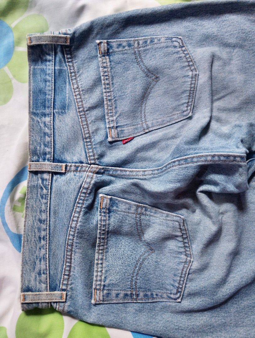 Levi's 501 Light Wash Button Fly Denim Jeans (Category: Jeans) located in Caloocan City. Submitted by froilanlac66702 (Listing ID 1455501211, Image 2). Description: Classic Levi's 501 jeans. Light blue wash. Button fly closure. Standard five-pocket design. Made from durable denim. Great for everyday wear. These are a staple for any wardrobe..