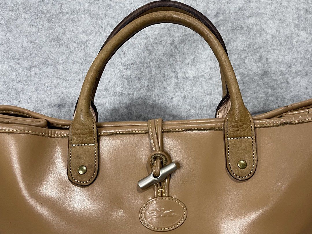 longchamp (Category: Luxury Bags & Wallets) located in Calamba. Submitted by thriftingoverload (Listing ID 1455597819, Image 3). Description: plus shipping fee parang napalitan na strap pero leather din at maganda naman.