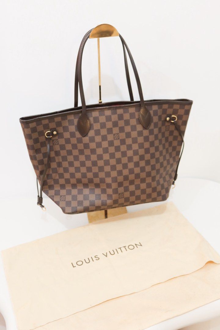 Louis Vuitton Damier Ebene Neverfull MM (Category: Luxury Bags & Wallets) located in Taguig. Submitted by luxelobbyofficial (Listing ID 1455512620, Image 3). Description: 🏷️ ₱59,000 • Rank: AB • 100% Authentic • With Entrupy Certificate • Pre-Owned, missing pochette • Inclusions: Original dust bag only _ Disclaimer: Luxe Lobby is an independent entity and is neither affiliated with nor endorsed by any of the brands displayed on this page. All tr