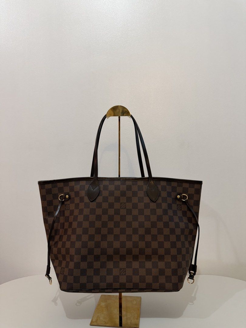 Louis Vuitton Damier Ebene Neverfull MM (Category: Luxury Bags & Wallets) located in Taguig. Submitted by luxelobbyofficial (Listing ID 1455512620, Image 2). Description: 🏷️ ₱59,000 • Rank: AB • 100% Authentic • With Entrupy Certificate • Pre-Owned, missing pochette • Inclusions: Original dust bag only _ Disclaimer: Luxe Lobby is an independent entity and is neither affiliated with nor endorsed by any of the brands displayed on this page. All tr