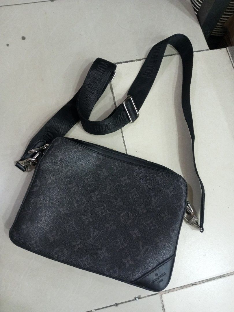 Louis Vuitton Monogram Eclipse Crossbody Bag (Category: Luxury Bags & Wallets) located in Bacolod City. Submitted by exequelgra46775 (Listing ID 1455616152, Image 1). Description: - Authentic Louis Vuitton Monogram Eclipse crossbody bag - Made in France, Spring/Summer 2017 collection (Date code: SP5001) - Stylish black and grey colorway - Features an adjustable strap for comfortable wear - Secure zipper closure - Ideal for everyday use - As New C