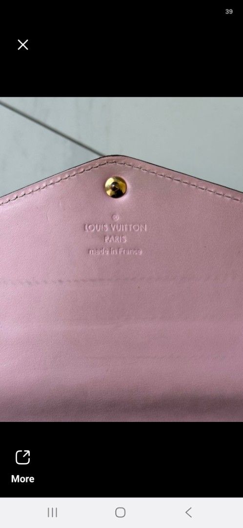 Louis Vuitton Vernis Long Wallet (Category: Luxury Bags & Wallets) located in Aguilar. Submitted by rica040104 (Listing ID 1455552581, Image 3). Description: - Authentic Louis Vuitton Vernis Wallet - Color: Yellow exterior with classic LV monogram - Interior: Pink with multiple card slots and a zip pocket - Authenticity: Made in France - Condition: Shows some signs of wear (exterior and interior, as pictured), but still has plenty of life left..