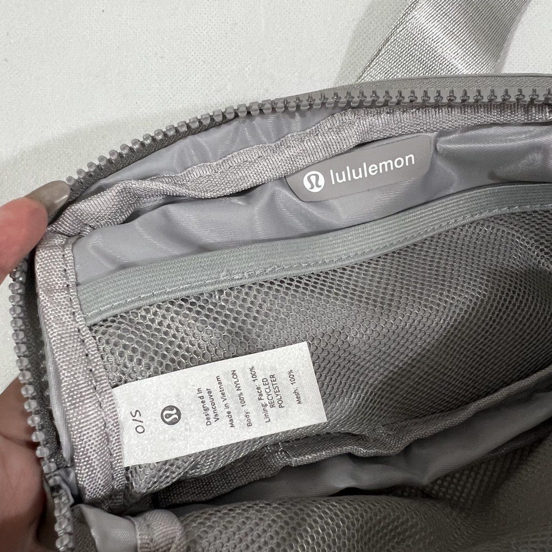 Lululemon Everywhere Belt Bag Grey Nylon (Category: Cross-body Bags) located in Cavite. Submitted by itsayaaa (Listing ID 1455613577, Image 2). Description: - Grey Lululemon Everywhere Belt Bag - Made with 100% nylon body and recycled polyester lining - Internal mesh pocket for organization - Adjustable strap with buckle closure for a custom fit - Secure zippered main compartment and front pocket - Ideal for everyday wear and workouts.