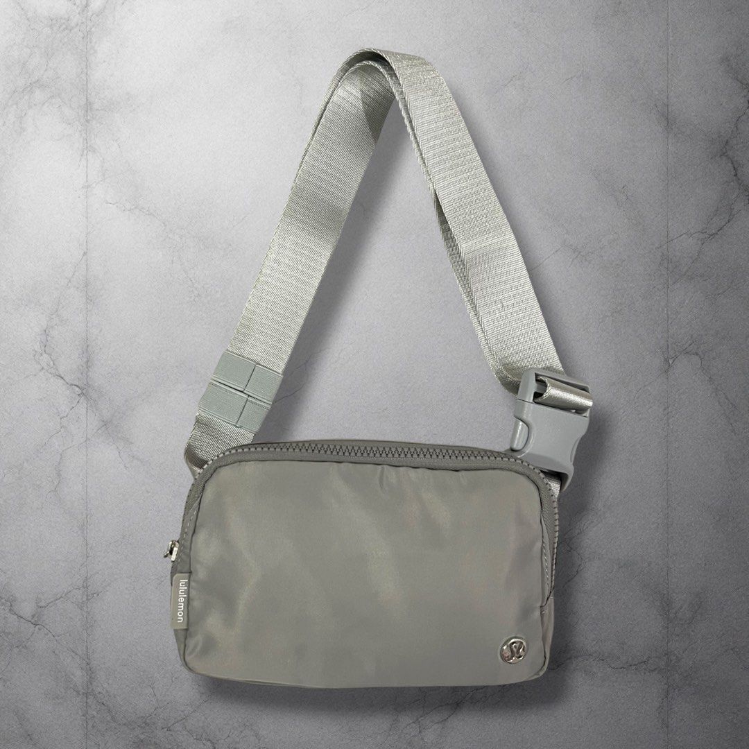 Lululemon Everywhere Belt Bag Grey Nylon (Category: Cross-body Bags) located in Cavite. Submitted by itsayaaa (Listing ID 1455613577, Image 1). Description: - Grey Lululemon Everywhere Belt Bag - Made with 100% nylon body and recycled polyester lining - Internal mesh pocket for organization - Adjustable strap with buckle closure for a custom fit - Secure zippered main compartment and front pocket - Ideal for everyday wear and workouts.