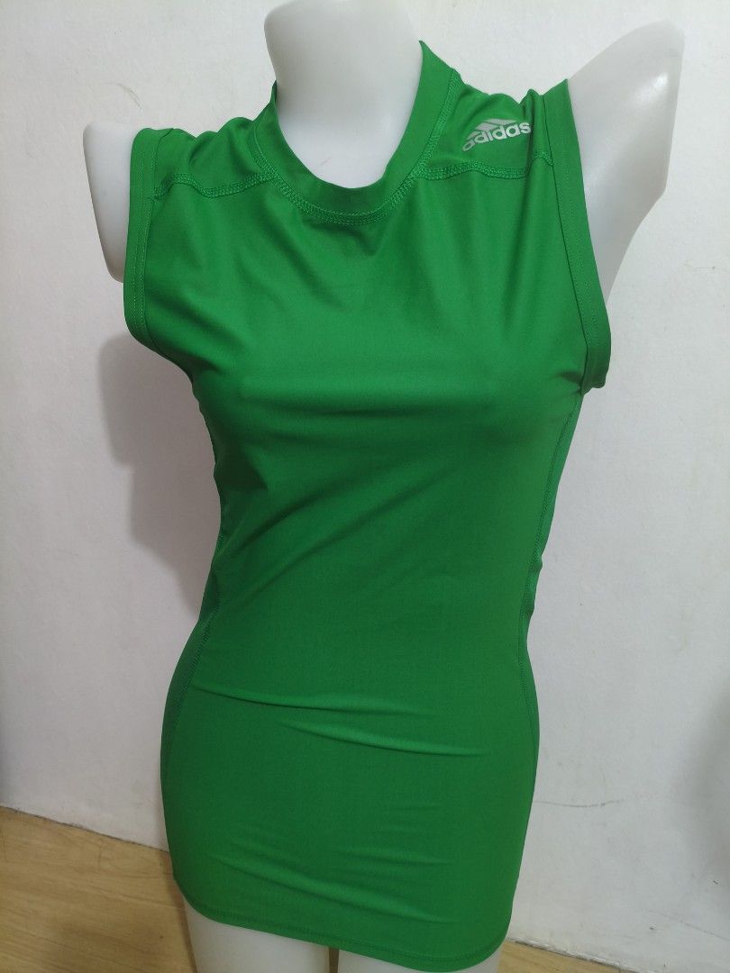 (M) Adidas Techfit Compression Sleeveless Activewear (Category: Activewear) located in Imus. Submitted by umusthave23 (Listing ID 1455557262, Image 2). Description: - Green Adidas sleeveless top - nonpadded - Techfit compression with Climachill technology - Ideal for workouts and sports - Made in the Philippines - Size: Medium - Ready for a new home!.