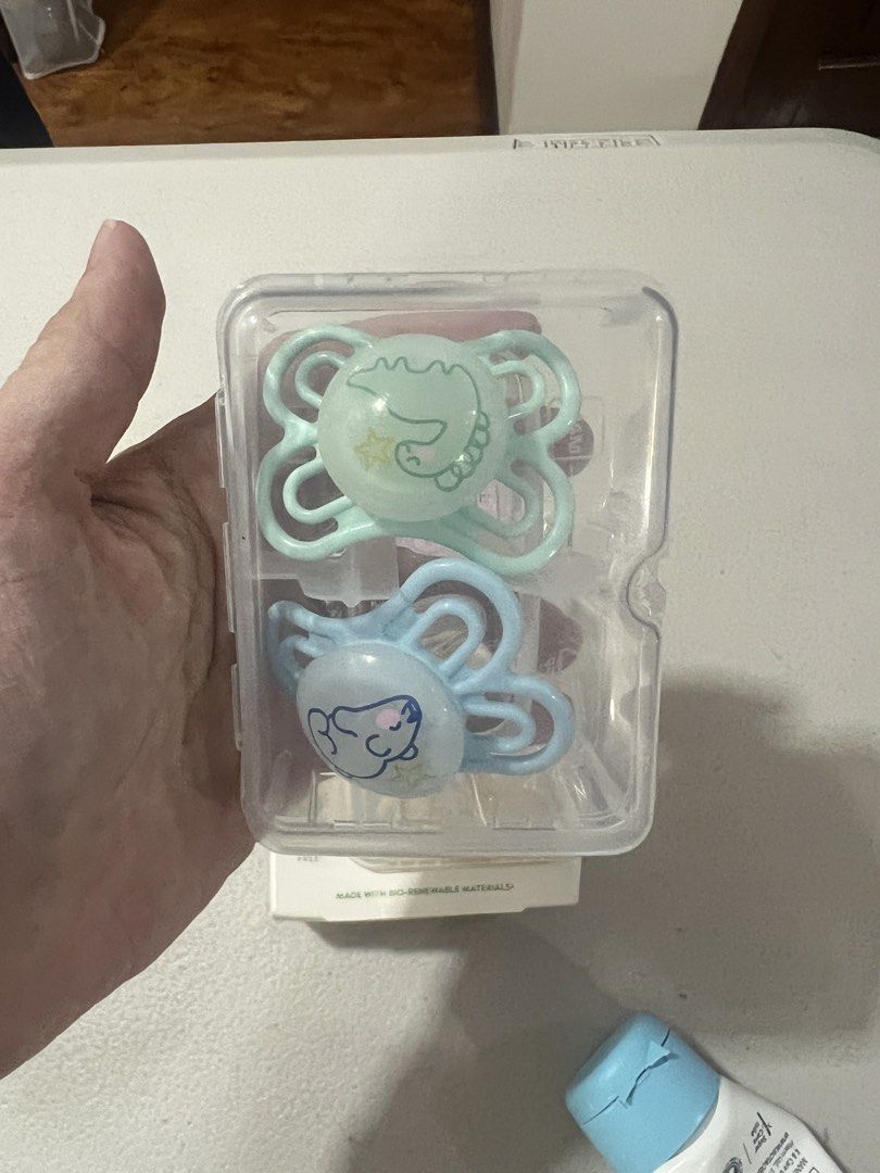 MAM Perfect Night Pacifiers 0–6 Months 🤍 (Category: Baby Toiletries & Grooming) located in Quezon City. Submitted by amandasee21 (Listing ID 1455645848, Image 3). Description: MAM Perfect Night Pacifiers 0–6 Months 🤍 Selling our MAM Perfect Night Silicone Pacifiers, suitable for babies 0–6 months. ✨ 4 pacifiers included ✨ Comes with 2 storage cases ✨ Extra-thin, flexible silicone nipple ✨ Designed to support healthy oral and dental development 