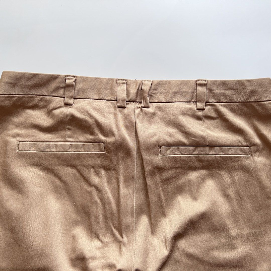mango basics tan trousers (Category: Other Bottoms) located in Dasmarinas. Submitted by pinex (Listing ID 1455621228, Image 3). Description: - L: 38 in. - W: 14 in. laid flat.