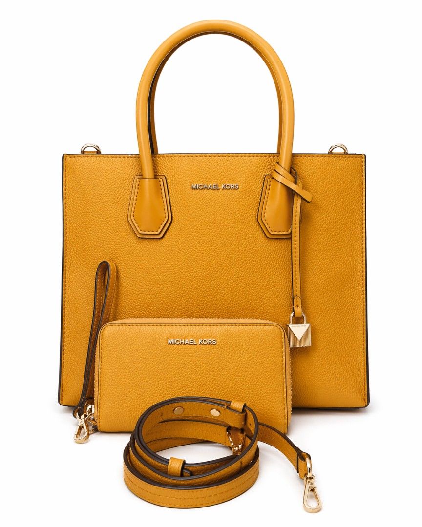 Michael Kors Authentic bag (Category: Luxury Bags & Wallets) located in Paranaque City. Submitted by carlybevs0502 (Listing ID 1455503725, Image 1). Description: personal authentic MK bag, soft leather, mustard yellow in color, gold hardware. in very good condition. Paired with wallet, add P500 only..