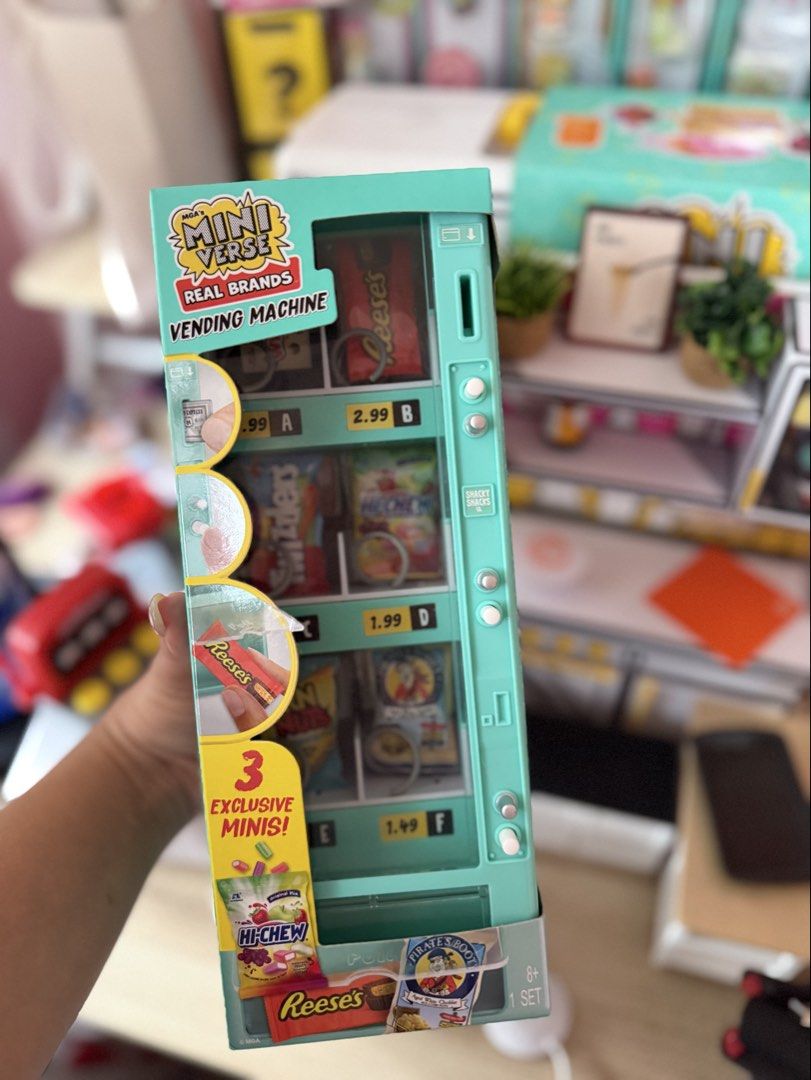 Mini Brands Real Brands Vending Machine Toy (Category: Kids Toys) located in Las Pinas. Submitted by breakthetrend (Listing ID 1455414634, Image 1). Description: - Mini Brands Real Brands Vending Machine - Includes 3 exclusive mini brands - Features popular snacks like Reese's, -Chew, and Pirate's Booty - Perfect for collectors and kids who love mini toys.