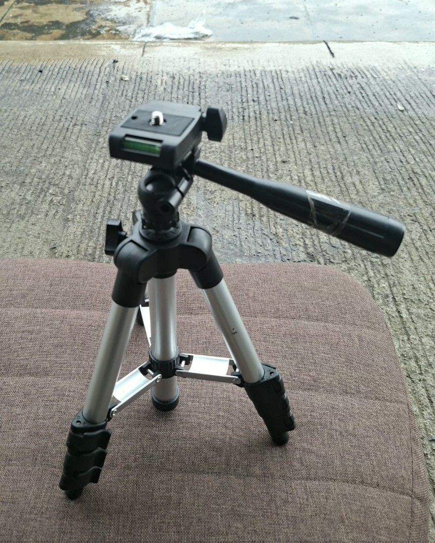 Mini Portable Camera Tripod with Level (Category: Tripods & Monopods) located in Manila. Submitted by glydelmalu86312 (Listing ID 1455548515, Image 1). Description: - Lightweight tripod for cameras - Adjustable legs for various heights - Built-in level for straight shots - Tilt and pan head for flexible framing - Folds compactly for easy storage and transport - Ideal for travel and home photography.