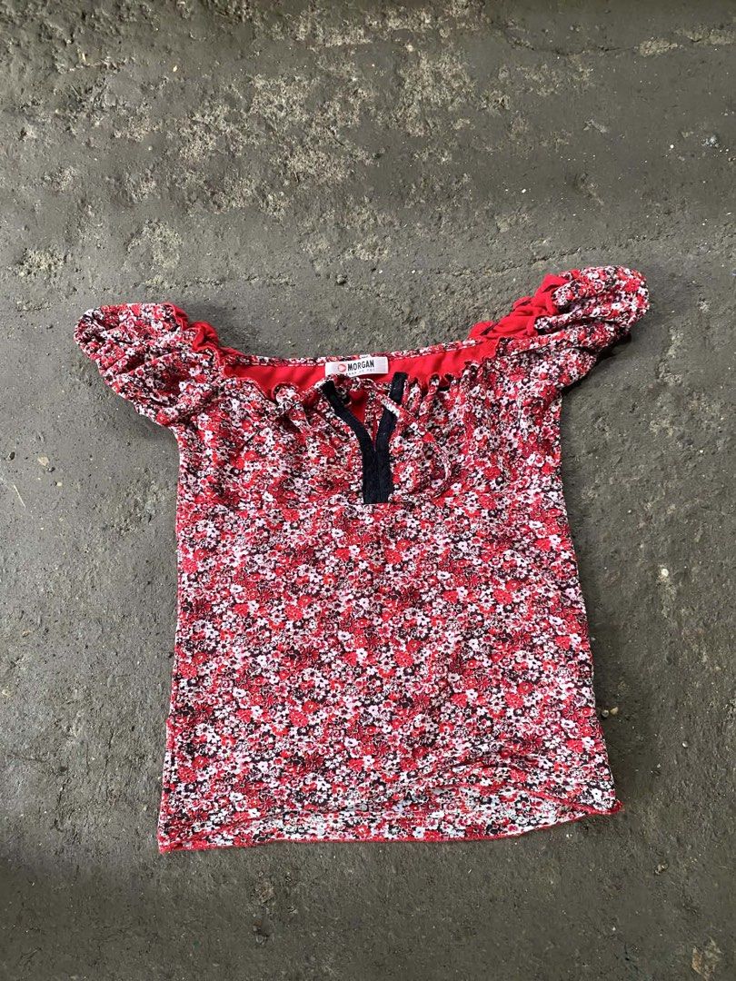 Morgan Red Floral Puff Sleeve Top (Category: Blouses) located in Barotac Nuevo. Submitted by ehsherjohn27 (Listing ID 1455555653, Image 1). Description: - Cute red top with a lovely floral print - Features stylish puff sleeves - Adorable tie detail at the neckline - Brand: Morgan - Made of stretchy material for comfort - Ideal for casual outings and everyday wear.