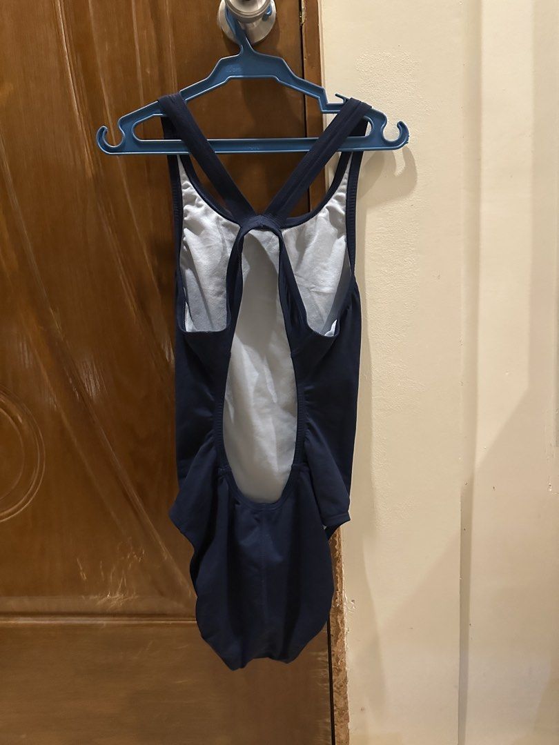 Nike Navy Blue One-Piece Swimsuit (Category: Bikinis & Swimsuits) located in Davao. Submitted by sewee (Listing ID 1455639834, Image 2). Description: - Navy blue Nike one-piece swimsuit - Criss-cross back straps for a secure fit - Open back design - Ideal for swimming laps or poolside lounging - Made with comfortable and durable material.