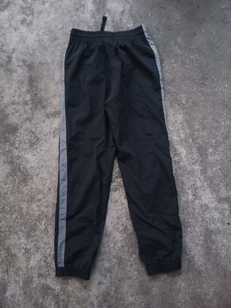 Nike nylon gray striped jogging pants for teens (Category: Joggers) located in Davao. Submitted by hisdef (Listing ID 1455613417, Image 2). Description: Nike nylon gray striped jogging pants for teens Condition- like new issue- none size on tag- large for teens Dimensions in inches waistline-22 up to 30 stretch length-36.
