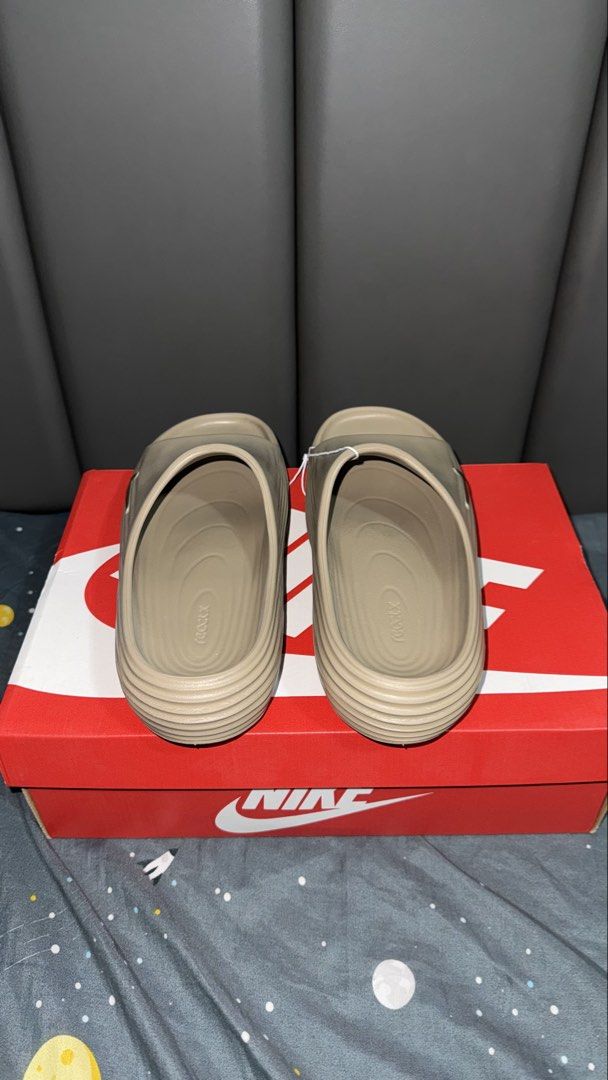 Nike Reactx Rejuven 8 sildes (Category: Slippers & Slides) located in Pasig City. Submitted by misyeloroceo13 (Listing ID 1455615363, Image 3). Description: Nike ReactX Rejuven8 Slides “Khahki” Size 7, 8 mens ₱2395 (SRP 3295).