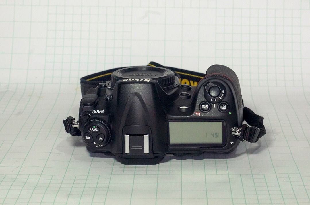 Nikon D300 Bundle (Category: Cameras) located in Quezon City. Submitted by boogiebay (Listing ID 1455599977, Image 3). Description: Nikon D300 Set for Sale: with 2 Lenses and multi power Battery Pack very low shutter count - 3286 Set / Bundle: P 18,000 1. Nikon D300 - in pristine condition • P 9000 shutter count 3286, only 2% of shutter life 2. Nikon 18-55mm AF-S DX 1:3.5-5.6G • P 3000 Nikon lens hood: HB-45 Nikon lens cap: front and back 3. Niko