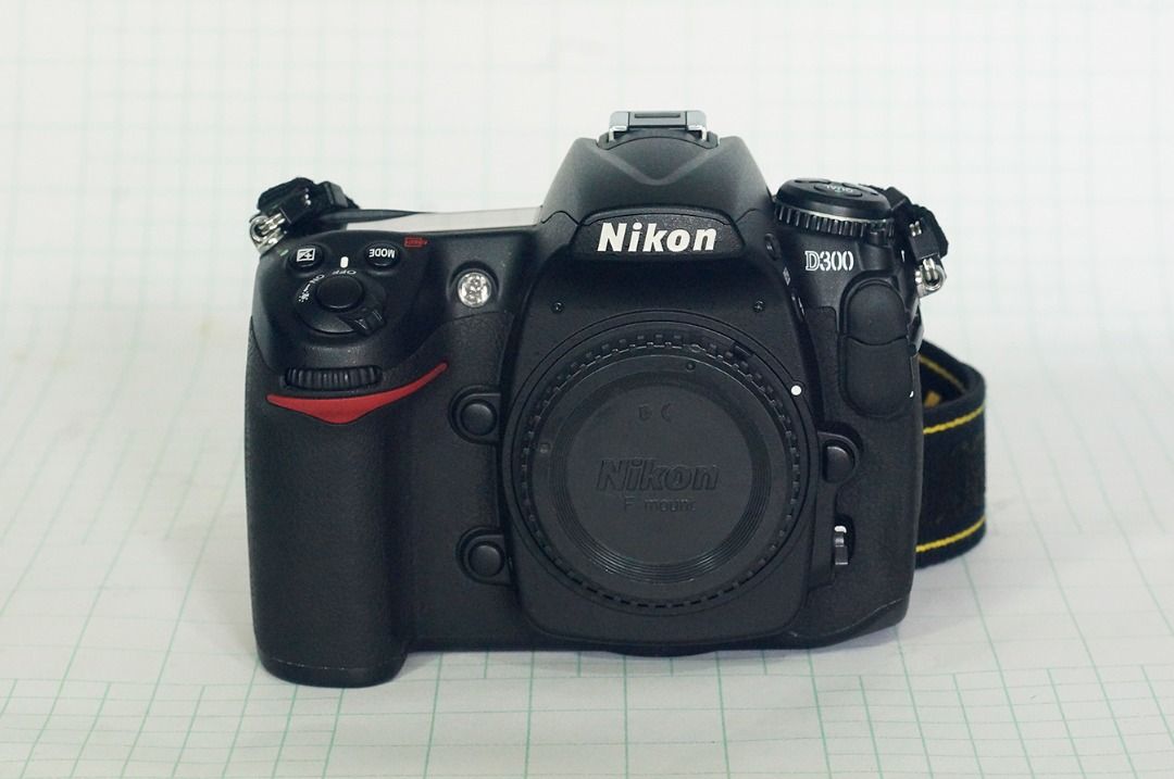 Nikon D300 Bundle (Category: Cameras) located in Quezon City. Submitted by boogiebay (Listing ID 1455599977, Image 2). Description: Nikon D300 Set for Sale: with 2 Lenses and multi power Battery Pack very low shutter count - 3286 Set / Bundle: P 18,000 1. Nikon D300 - in pristine condition • P 9000 shutter count 3286, only 2% of shutter life 2. Nikon 18-55mm AF-S DX 1:3.5-5.6G • P 3000 Nikon lens hood: HB-45 Nikon lens cap: front and back 3. Niko