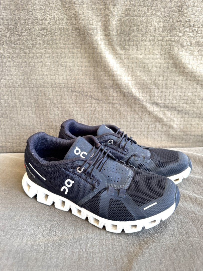 On Cloud 5 Running Shoes Navy Blue (Category: Sneakers) located in Cagayan de Oro. Submitted by wearnani (Listing ID 1455561969, Image 1). Description: - Navy blue On Cloud 5 running shoes - Lightweight and comfortable for everyday wear or training - Features signature CloudTec cushioning - Comes with original laces - Ideal for pavement running or gym workouts.