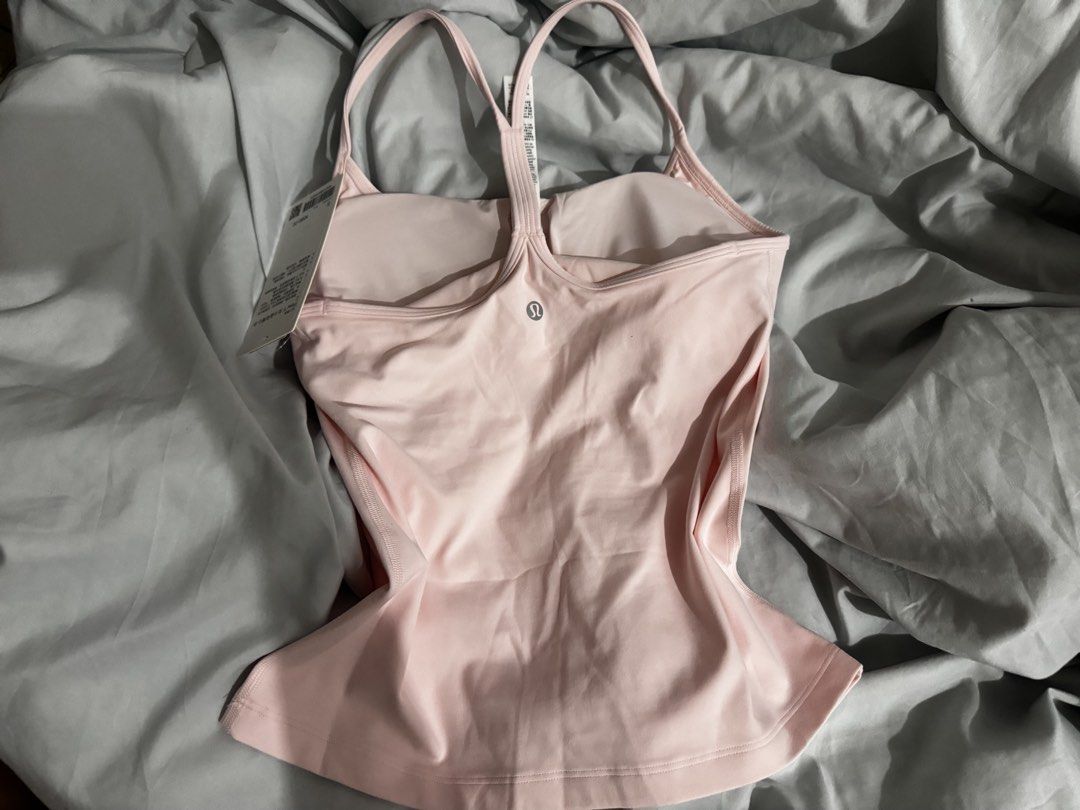 Original Lululemon Y align tank top (Category: Activewear) located in Quezon City. Submitted by mtchfrvr (Listing ID 1455674023, Image 2). Description: Pasalubong from my tita from Beijing, China 🇨🇳❤️ Unfortunately, the Small is still a bit too big for me 😓 Original price in China: around ₱5,200. .