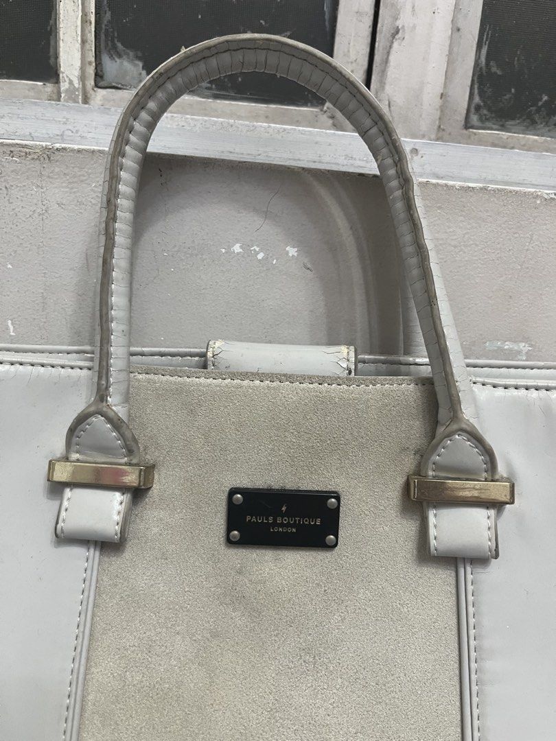 Pauls Boutique London Grey Bag (Category: Shoulder Bags) located in Bacoor. Submitted by cjpcp (Listing ID 1455598418, Image 2). Description: Selling as is Pauls Boutique Grey Bag With shoulder strap Can be worn both as a handbag and on the shoulder Has visible peeling Stains in interior PRICE IS NEGOTIABLE.