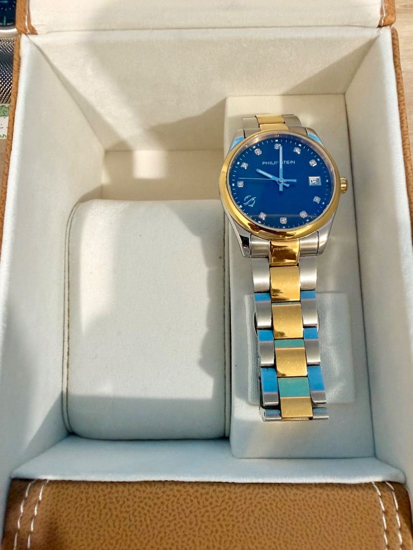 Philip Stein Watch Two-Tone Lab-Grown Diamond (Category: Luxury Watches) located in San Juan City. Submitted by william_mc_1356 (Listing ID 1452301141, Image 2). Description: - Gender: Unisex - Authentic Philip Stein Watch - Two-tone stainless steel band - Dial features lab-grown diamonds - Diamond: 10 pcs / 0.05ctw - Includes original box, certificate of authenticity, and shopping bag - Equipped with Natural Frequency Technology -Dial Color: Bla