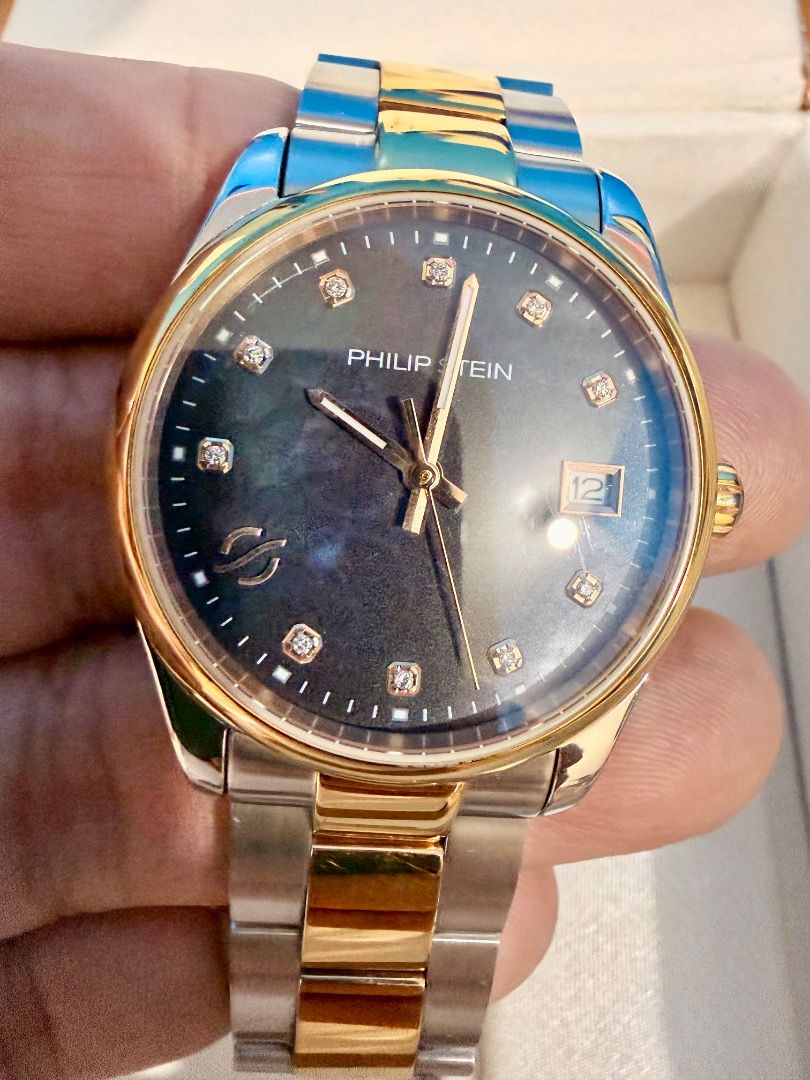 Philip Stein Watch Two-Tone Lab-Grown Diamond (Category: Luxury Watches) located in San Juan City. Submitted by william_mc_1356 (Listing ID 1452301141, Image 3). Description: - Gender: Unisex - Authentic Philip Stein Watch - Two-tone stainless steel band - Dial features lab-grown diamonds - Diamond: 10 pcs / 0.05ctw - Includes original box, certificate of authenticity, and shopping bag - Equipped with Natural Frequency Technology -Dial Color: Bla
