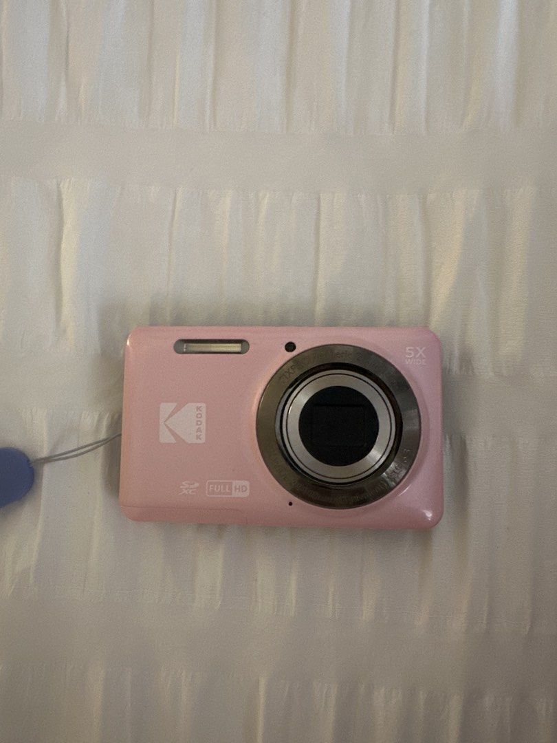 Pink Kodak PixPro Digital Camera 5x Wide Full HD (Category: Cameras) located in Caloocan City. Submitted by triciacab (Listing ID 1455504085, Image 1). Description: - Pink Kodak Digital Camera - 5x Wide Optical Zoom - Records in Full HD - Comes with Wrist Strap - Compact and Pocket-Friendly - Ideal for capturing memories on the go - Easy to use.