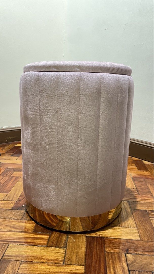 Pink Storage Stool Chair (Category: Chairs) located in Pasig City. Submitted by ruthmari (Listing ID 1455638777, Image 2). Description: Pink Stool chair with storage inside. Lightly used just kept under my table. Sturdy, can stand on it. Fits a lot of stuff. Flaw: last pic shows a slight bend it's really not obvious but it came to me that way. Grab / Lalamove shouldered by buyer .