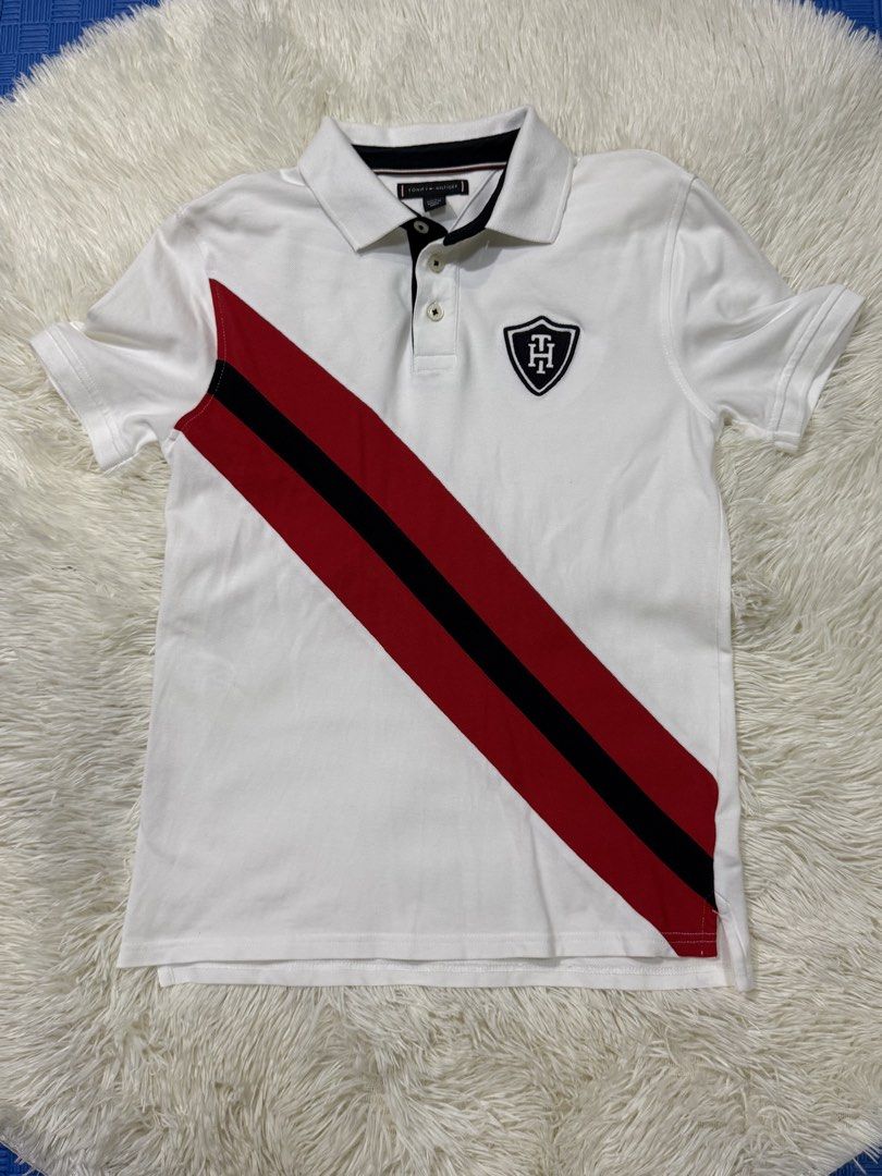 Polo Shirt for Kids (Category: Babies & Kids Fashion) located in Muntinlupa City. Submitted by avampaya (Listing ID 1455622139, Image 1). Description: Tommy Hilfiger for Boys Size Large (12-14yo) but fits my 8yo son Used twice In excellent condition.