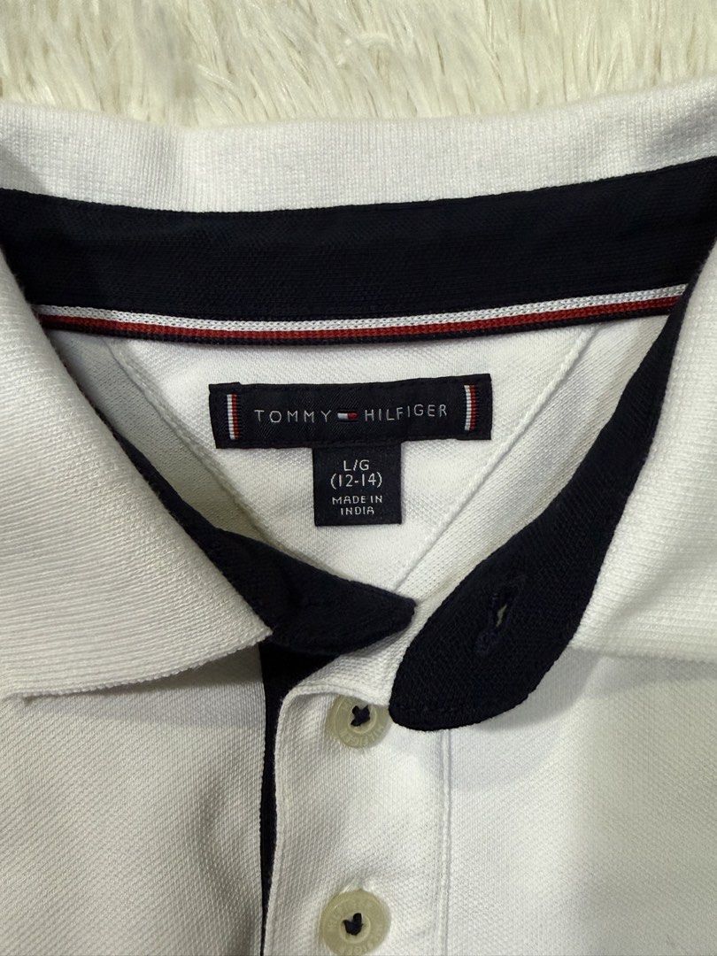 Polo Shirt for Kids (Category: Babies & Kids Fashion) located in Muntinlupa City. Submitted by avampaya (Listing ID 1455622139, Image 3). Description: Tommy Hilfiger for Boys Size Large (12-14yo) but fits my 8yo son Used twice In excellent condition.