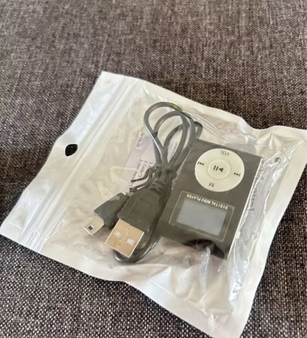 Portable MP3 Player Mini Digital LCD Screen (Category: Portable Music Players) located in Caloocan City. Submitted by justprettythings07 (Listing ID 1455537062, Image 2). Description: • SD Card and headpiece/headset not included • Color black only.