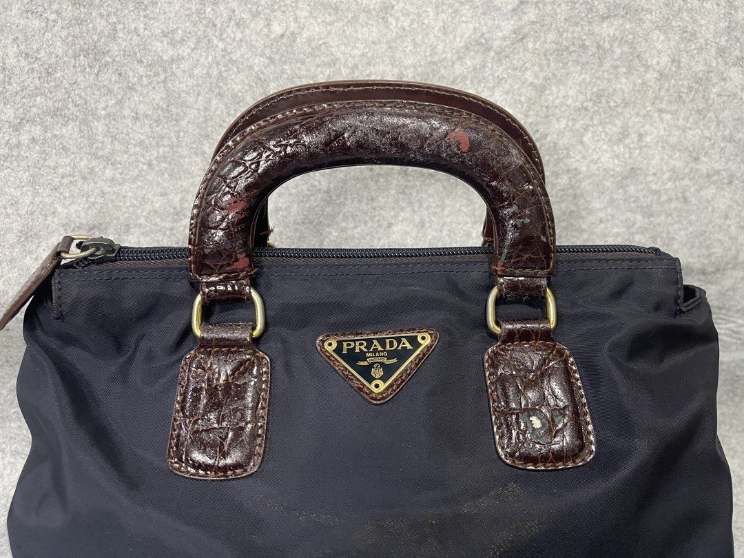 prada (Category: Luxury Bags & Wallets) located in Calamba. Submitted by thriftingoverload (Listing ID 1455606553, Image 3). Description: plus shipping fee may mga issue na sya.