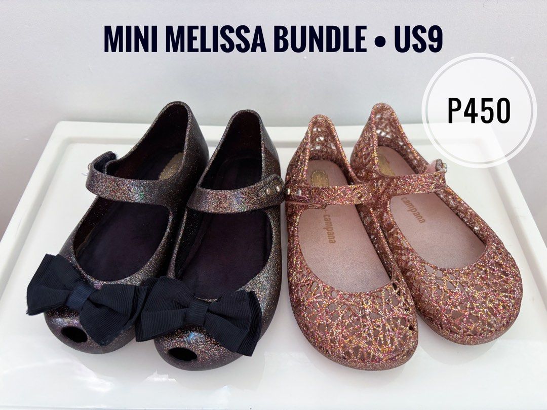 Preloved Bundle Mini Melissa Bundle US9 Jelly Shoes (Category: Babies & Kids Fashion) located in Marilao. Submitted by lmsboutique (Listing ID 1455582172, Image 1). Description: - Bundle of 2 pairs Mini Melissa jelly shoes - Pair 1: Dark glitter with black bows - Pair 2: Rose gold glitter with cutout design - Both are Mary Jane style with buckle straps - Perfect for little girls (Natatanggal na po yung black ribbon nung dollshoes dinikitan ko lan