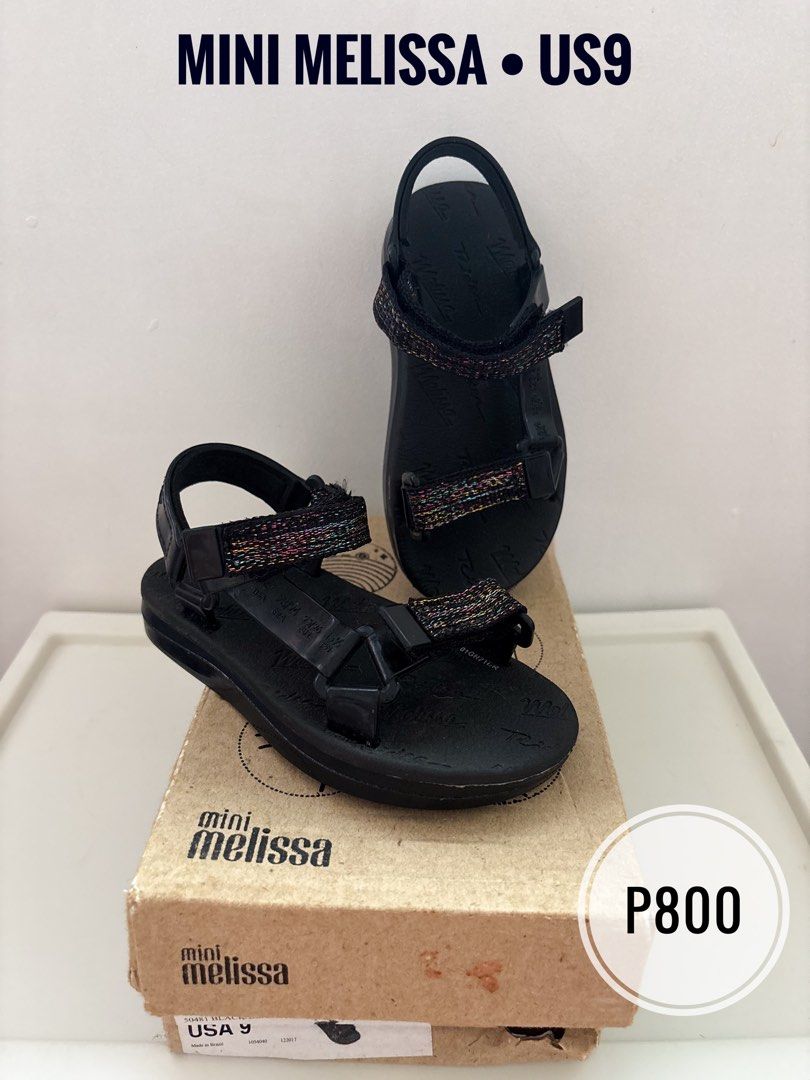 Preloved Mini Melissa Black Sandals US9 (Category: Babies & Kids Fashion) located in Marilao. Submitted by lmsboutique (Listing ID 1455589606, Image 1). Description: - Black Mini Melissa sandals - Size US 9 - Adjustable straps with colorful glitter detail - Soles feature Melissa and Rider logos - Comes with original box (medyo may yupi na po yung box and no dustbag) - may matigas na nakadikit sa outsole .