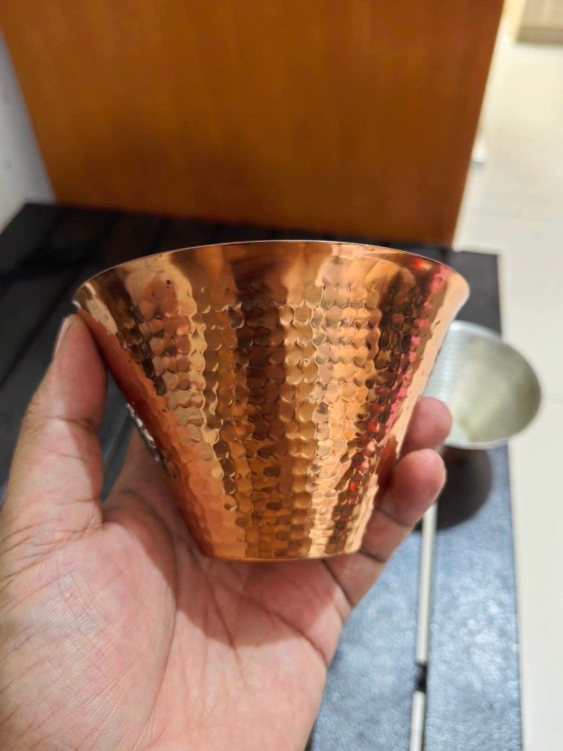 Premium Brand Copper Mule Cup (Category: Other Kitchenware & Tableware) located in Cebu City. Submitted by dudes_villanueva (Listing ID 1455526763, Image 1). Description: Hand-hammered copper RED & WHITE Moscow Mule Cup / Iced Coffee Cup featuring a textured exterior and a silver-toned interior Lining. 3 Cups Available. 📌 Premium Brand Copper Mule Cup. 📌 In excellent condition. With few very light tarnish. 📌 Makapal. Matibay. Diameter : 4.20 i