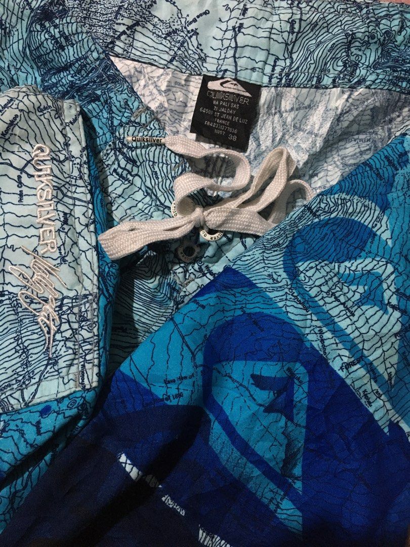 Quiksilver Board Shorts - Blue Map Print (Category: Swim Trunks & Board Shorts) located in Manila. Submitted by findingtreasure. (Listing ID 1455609248, Image 3). Description: - Brand: Quiksilver - Size: 38 - Design: Vibrant blue map print - Features: Drawstring waist, side pocket - Ideal for: Beach, pool, or any adventure.