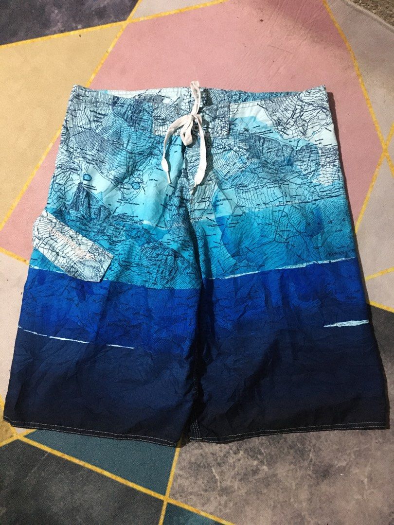 Quiksilver Board Shorts - Blue Map Print (Category: Swim Trunks & Board Shorts) located in Manila. Submitted by findingtreasure. (Listing ID 1455609248, Image 1). Description: - Brand: Quiksilver - Size: 38 - Design: Vibrant blue map print - Features: Drawstring waist, side pocket - Ideal for: Beach, pool, or any adventure.