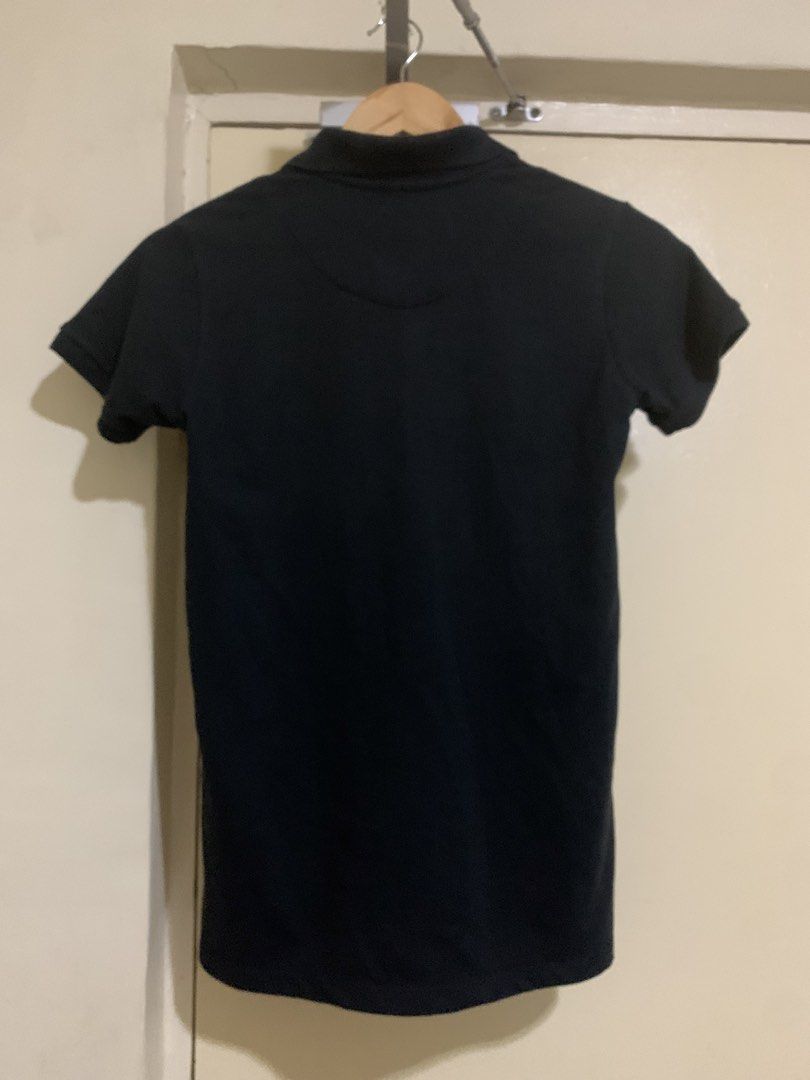 Regatta Essentials Dark Blue Polo Shirt (Category: Others Tops) located in Paranaque City. Submitted by JarlemsApparel (Listing ID 1455622655, Image 3). Description: *** Kindly look at ALL the pictures first and READ the product description before asking further question, thank you :)) *price is still slightly negotiable * don’t mind the dirty mirror, those are not stains on the shirt :)) - Brand: Regatta Essentials - Color: Dark Blue - Style: Sh
