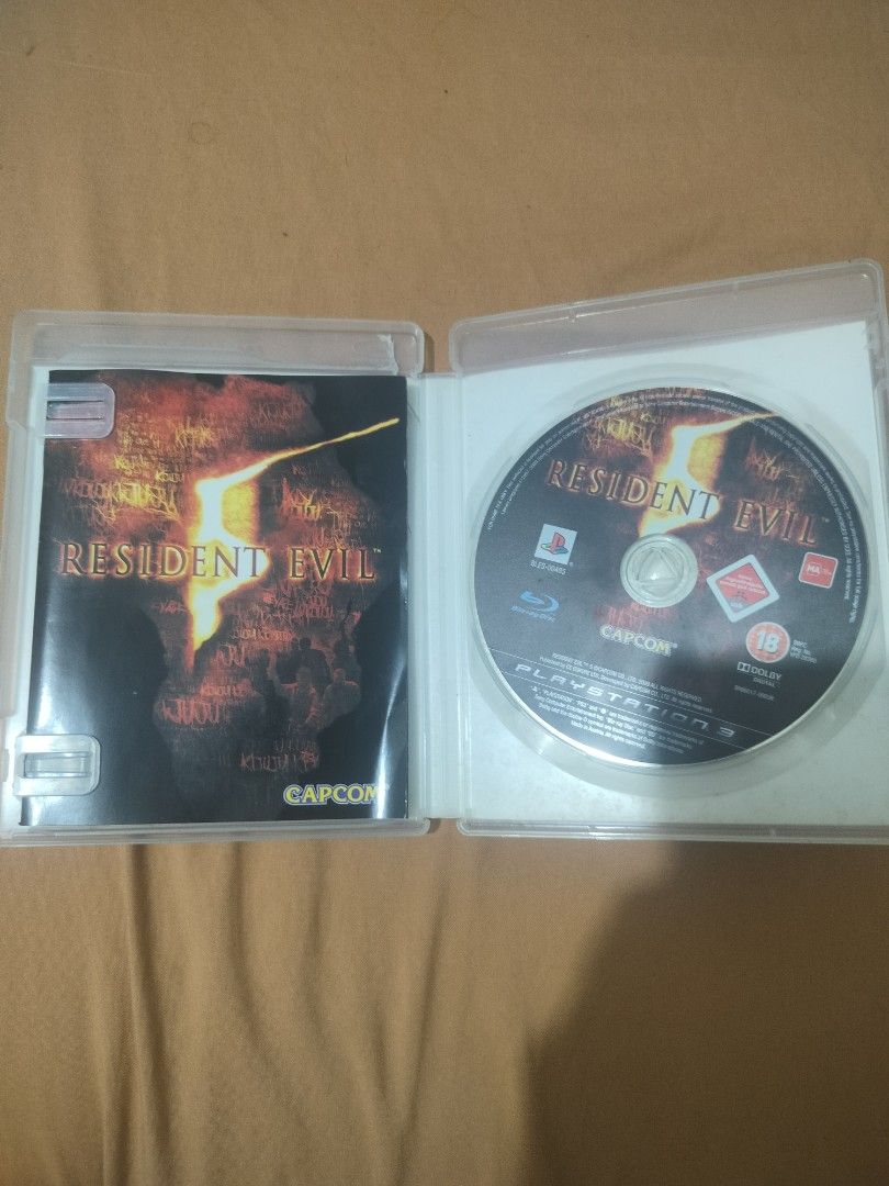 Resident Evil 5 PS3 (Category: PlayStation) located in Paranaque City. Submitted by crumbsama (Listing ID 1455671760, Image 2). Description: The games are lightly used and in good working condition. 🎮 Discs are lightly used and well-maintained 📦 Cases have some signs of wear from use/storage 📀 Games have been tested and are working 📍 Location: Parañaque City 🚆 Meetup: SM Sucat, SM BF, LRT-1 Dr. Santos Station 🛵 Delivery: Lalamove available 