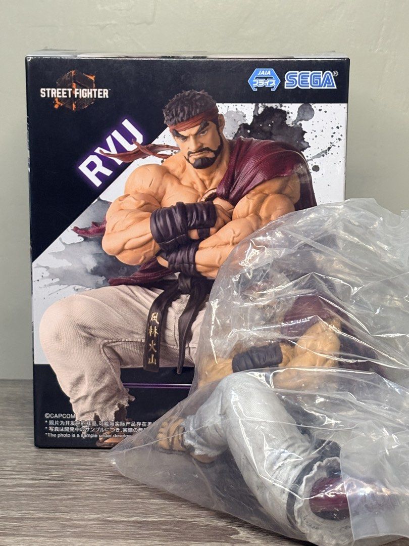 SEGA Street Fighter Ryu Premium Figure (Category: Figurines & Statues) located in Manila. Submitted by ejelo24 (Listing ID 1455528509, Image 2). Description: - SEGA Street Fighter Ryu Figure - From the "Chibi-nu-se" series - Comes in original, opened box - Figure is still sealed in plastic packaging Mode of payment: Bank transfer/GCash/Cash if meet up Mode of shipping: Meet up or Delivery Buyer to shoulder and book Lalamove for same day delivery.