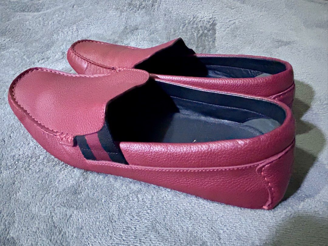 Gucci Men's Authentic Red Calf Leather Driver Loafers (Category: Casual Shoes) located in Valenzuela. Submitted by t2don42 (Listing ID 1419201281, Image 3). Description: This is an AUTHENTIC pair of GUCCI Calfskin Web Mens Driver Loafers in size 9 1/2 in Red. These beautifully tailored loafers are crafted of grained red calfskin leather and rubber soles. These slip on shoes feature the iconic Gucci web detail on the sides in red and black. RFS: n