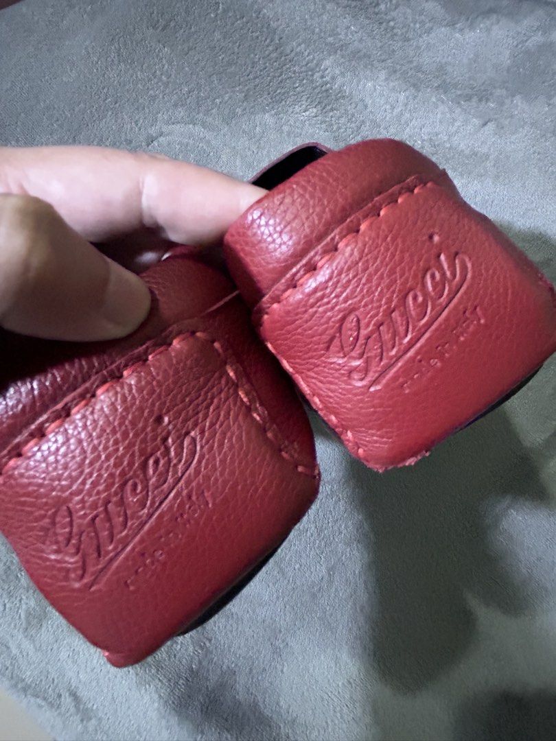 Gucci Men's Authentic Red Calf Leather Driver Loafers (Category: Casual Shoes) located in Valenzuela. Submitted by t2don42 (Listing ID 1419201281, Image 2). Description: This is an AUTHENTIC pair of GUCCI Calfskin Web Mens Driver Loafers in size 9 1/2 in Red. These beautifully tailored loafers are crafted of grained red calfskin leather and rubber soles. These slip on shoes feature the iconic Gucci web detail on the sides in red and black. RFS: n