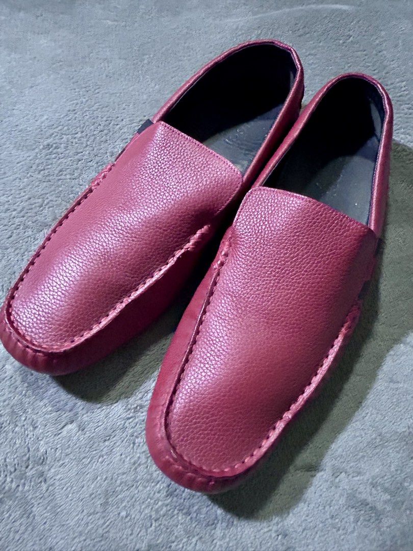 Gucci Men's Authentic Red Calf Leather Driver Loafers (Category: Casual Shoes) located in Valenzuela. Submitted by t2don42 (Listing ID 1419201281, Image 1). Description: This is an AUTHENTIC pair of GUCCI Calfskin Web Mens Driver Loafers in size 9 1/2 in Red. These beautifully tailored loafers are crafted of grained red calfskin leather and rubber soles. These slip on shoes feature the iconic Gucci web detail on the sides in red and black. RFS: n