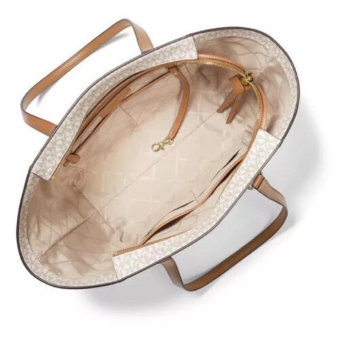 Shoulder Bag (Category: Tote Bags) located in Singapore. Submitted by labellaixora (Listing ID 1455523708, Image 2). Description: - Shoulder bag - Classic monogram print - Tan leather trim and handles - Spacious interior - Not for fussy buyer - ⭐NO RETURNS OR REFUNDS ONCE SOLD. - ⭐NO SELF-COLLECTION.