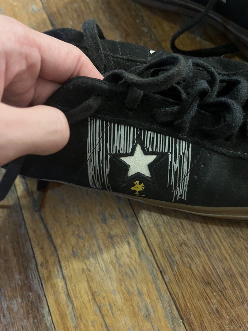 Snoopy X Converse Black Shoes Collab (Category: Casual Shoes) located in Manila. Submitted by ignasho (Listing ID 1455587935, Image 2). Description: - Limited edition piece from the official Converse x Peanuts collaboration. - One Star OX silhouette - Has Snoopy and Woodstock in the rain on the outer side of the shoe - Material: Suede - Slightly dusty from storage but can easily be cleaned. - Will take offers.