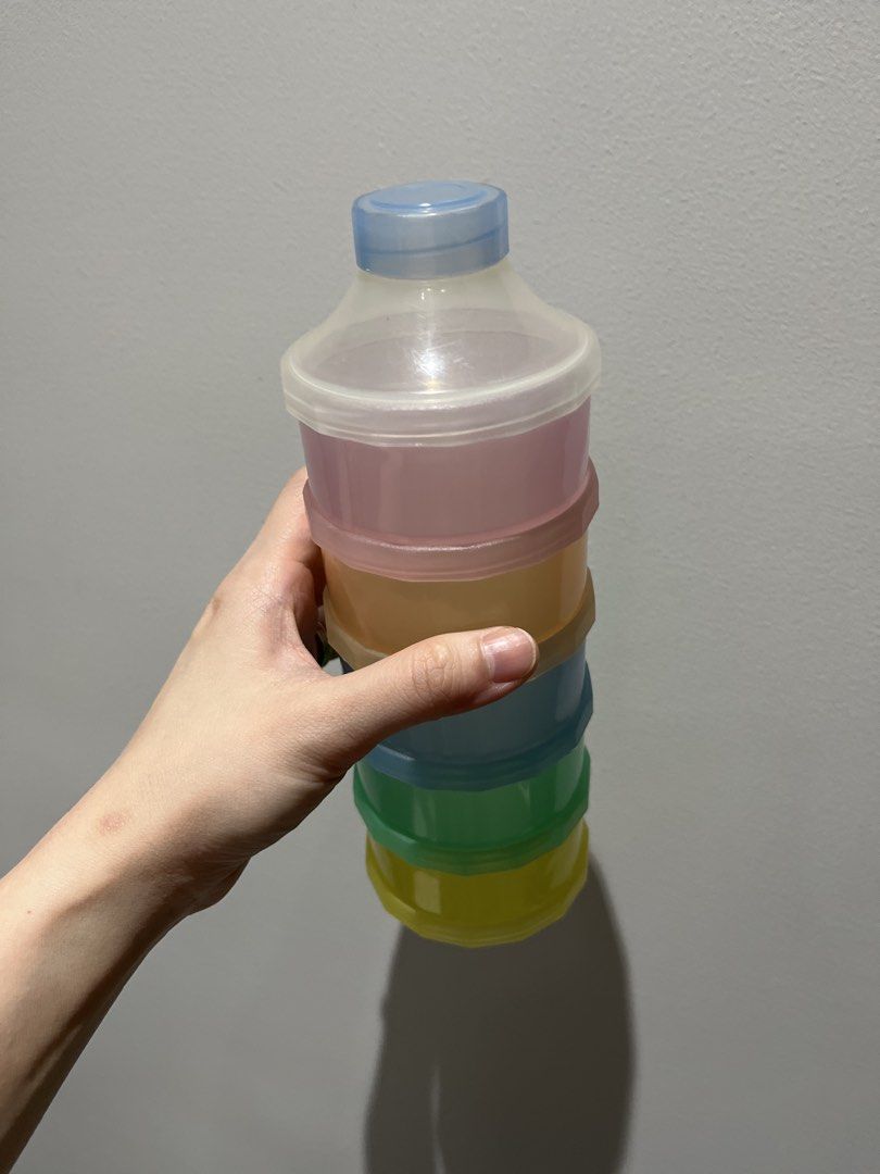 Stackable Formula Dispenser Container (Category: Breastfeeding & Bottle Feeding) located in Quezon City. Submitted by tcsej (Listing ID 1455576322, Image 2). Description: - Stackable container for formula or snacks - Each layer is separate and can be used individually - Ideal for on-the-go feeding - Easy to clean and store - Available in multiple pastel colors.