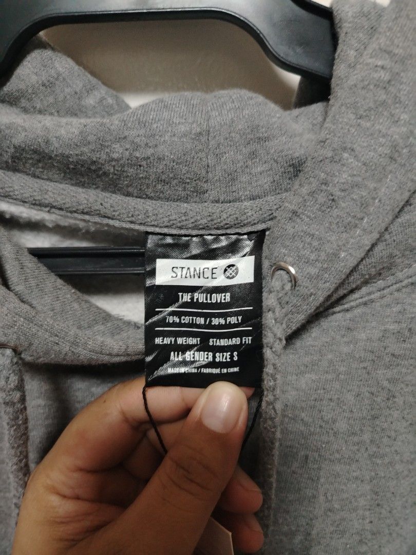 Stance The Pullover Grey Hoodie Size S (Category: Hoodies) located in Muntinlupa City. Submitted by thebrandedrackph (Listing ID 1455556060, Image 3). Description: - Stance Pullover Hoodie - Color: Grey - Material: 70% Cotton, 30% Polyester (Heavyweight) - Fit: Standard - Size: S (All Gender) - Features: Stance logo on sleeve - Ideal for: Casual wear This Stance 'The Pullover' hoodie is a versatile and durable addition to any casual wardrobe. Fea