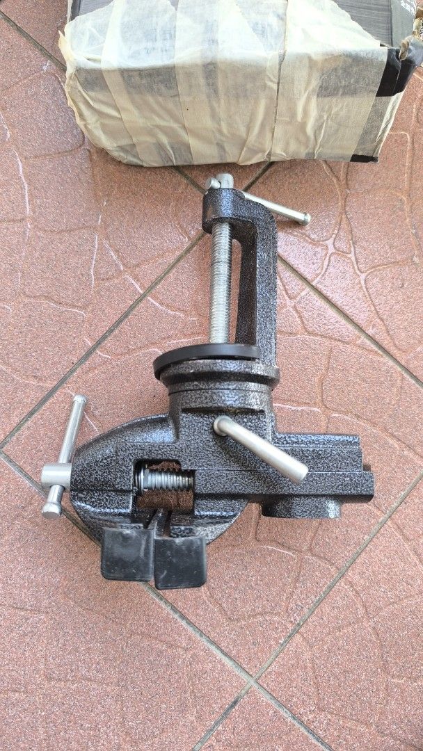 Table Vice (Category: Home Improvement Tools & Accessories) located in Singapore. Submitted by musiccharm (Listing ID 1455592980, Image 3). Description: Heavy Duty Table Vice - Ideal for DIY, crafting, and repair projects - Provides a secure and stable grip on workpieces.