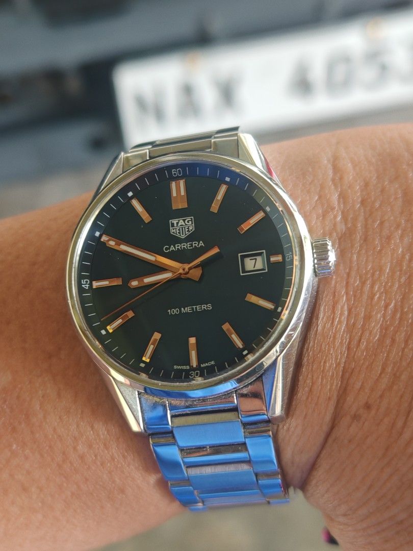 TAG Heuer Carrera Automatic Watch - 100 Meters (Category: Men's Watches) located in Lipa City. Submitted by dwinr6 (Listing ID 1455625944, Image 1). Description: - Authentic TAG Heuer Carrera 39mm - Swiss Made quartz Movement - Stainless Steel Case and Bracelet - blue Dial with Date Window Rose gold markers - Scratch-Resistant Sapphire Crystal With box & card - .