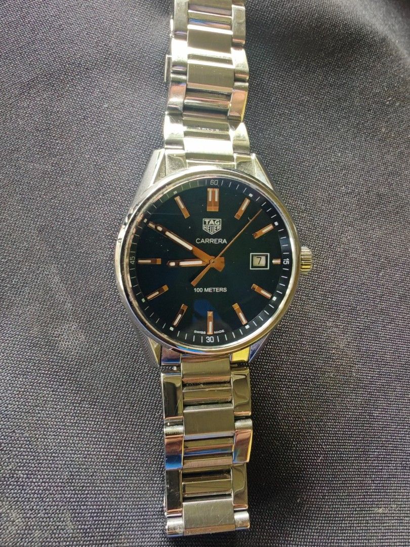 TAG Heuer Carrera Automatic Watch - 100 Meters (Category: Men's Watches) located in Lipa City. Submitted by dwinr6 (Listing ID 1455625944, Image 2). Description: - Authentic TAG Heuer Carrera 39mm - Swiss Made quartz Movement - Stainless Steel Case and Bracelet - blue Dial with Date Window Rose gold markers - Scratch-Resistant Sapphire Crystal With box & card - .