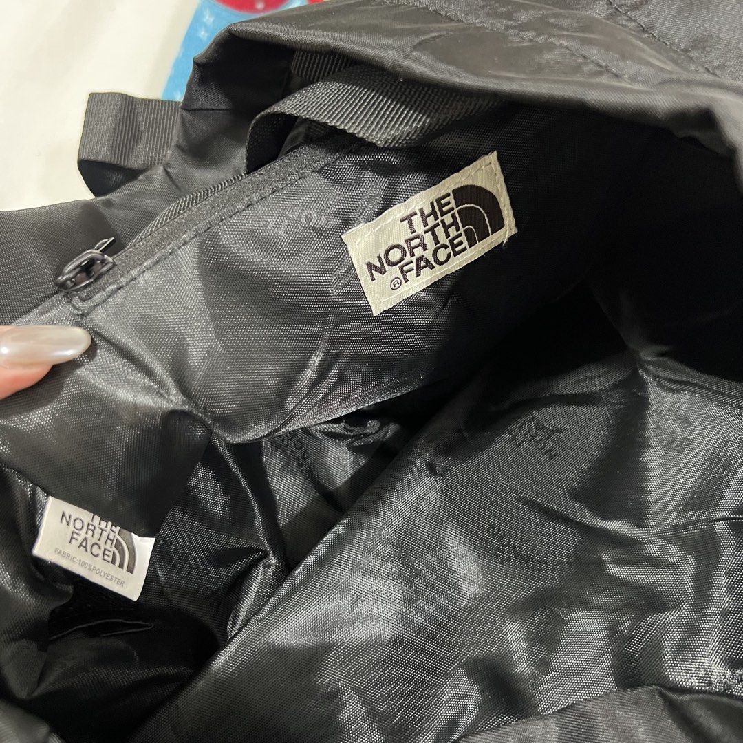 The North Face Black Tote Backpack (Category: Backpacks) located in Cavite. Submitted by itsayaaa (Listing ID 1455613570, Image 2). Description: - Brand: The North Face - Color: Black - Type: Tote Backpack - Material: 100% Polyester - Features: Side pockets, buckle closure - Versatile: Can be worn as a backpack or a tote - Ideal for: Everyday use, travel.